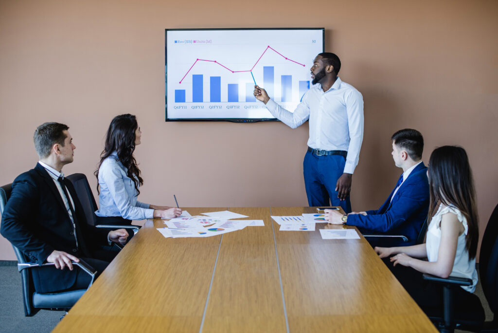 Businessman Presenting Chart Meeting 1024x684
